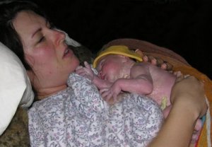 Photograph of Deborah and baby Ella minutes after birth.